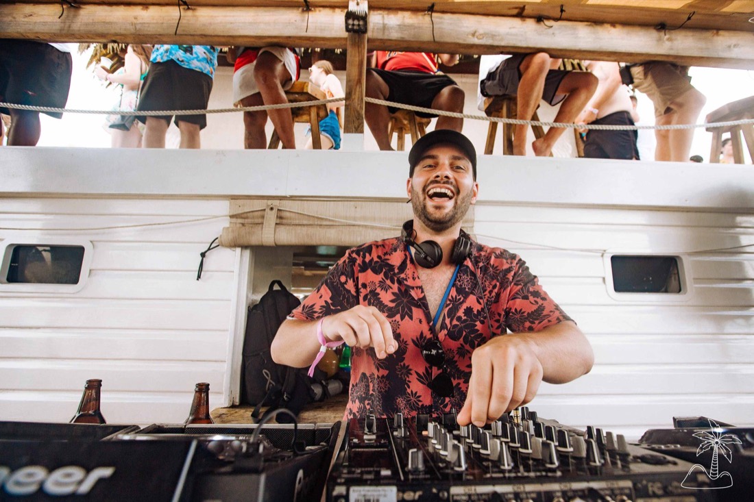 Christian Pillot playing a set behind CDJs