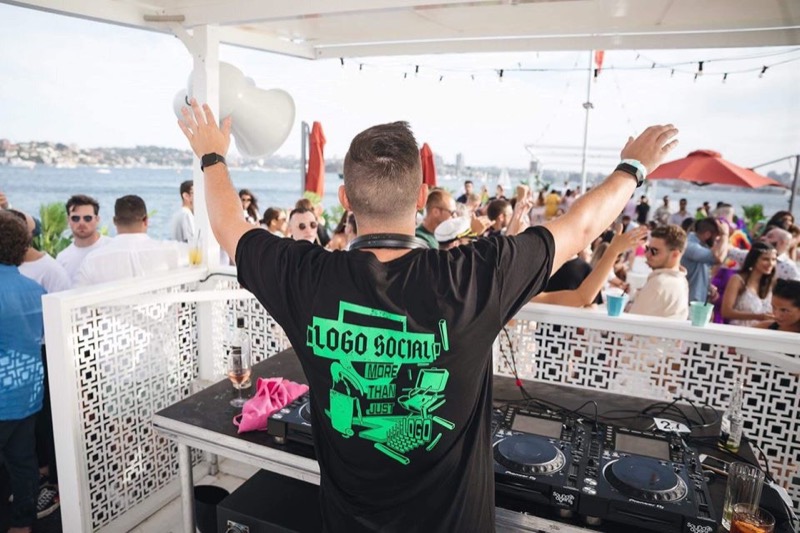 Arms up at a boat party