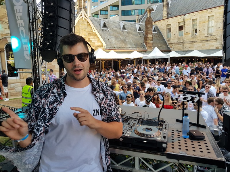 Playing to an outdoor crowd in the daytime